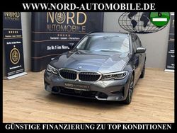 Grau Gebraucht 2021 BMW 320e Sport Line Kombi | 25.400 € (Fairer Preis)