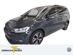 Grau Gebraucht 2023 VW Touran Highline Van / Kleinbus | 29.980 € (Fairer Preis)