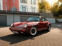 Granatrotmetallic Gebraucht 1986 Porsche 911 Carrera Coupé | 63.911 €