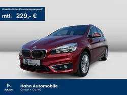 Flamencorot brillanteffekt met Gebraucht 2015 BMW 220 Active Tourer Luxury Line Van / Kleinbus | 16.930 € (Teuer)