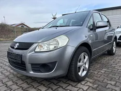 Grau Gebraucht 2009 Suzuki SX4 Comfort Limousine | 4.900 € (Fairer Preis)