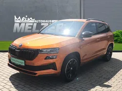 Orange Gebraucht 2024 Skoda Karoq SportLine SUV | 38.880 € (Fairer Preis)