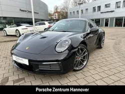Tiefschwarzmetallic Gebraucht 2024 Porsche 911 Carrera Coupé | 126.450 € (Guter Preis)