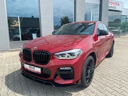 Flamencorot brillanteffekt metal Gebraucht 2019 BMW X4 M Sport SUV | 39.500 € (Fairer Preis)