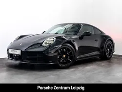 Tiefschwarzmetallic Gebraucht 2024 Porsche 911 Carrera Coupé | 157.800 € (Fairer Preis)
