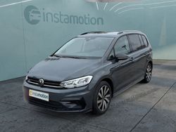 Grau Gebraucht 2024 VW Touran Pro Van / Kleinbus | 38.599 € (Fairer Preis)