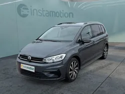 Grau Gebraucht 2024 VW Touran Pro Van / Kleinbus | 38.098 € (Fairer Preis)