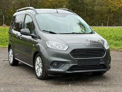 Grau Gebraucht 2019 Ford Tourneo Courier Titanium Van / Kleinbus | 7.490 € (Fairer Preis)