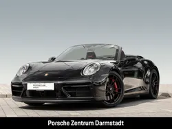 Tiefschwarzmetallic Gebraucht 2024 Porsche 911 Carrera 4 GTS Cabrio | 170.911 € (Fairer Preis)