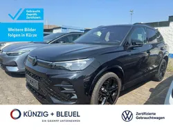 Grenadilschwarz metallic Gebraucht 2024 VW Tiguan R-line SUV | 50.380 € (Guter Preis)