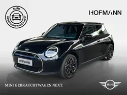 Midnight black metallic Gebraucht 2024 Mini Cooper SE Favoured Kleinwagen | 32.428 €