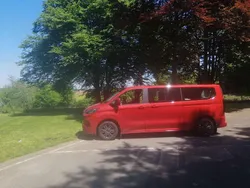 Rot Gebraucht 2024 Ford Tourneo Custom Titanium Van / Kleinbus | 49.500 € (Teuer)