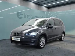 Grau Gebraucht 2024 VW Touran Pro Van / Kleinbus | 36.849 € (Fairer Preis)