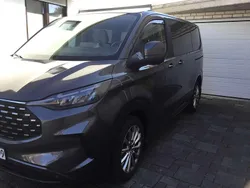 Grau Gebraucht 2024 Ford Tourneo Custom Van / Kleinbus | 48.900 €