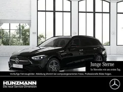 Obsidianschwarz metallic Gebraucht 2024 Mercedes C300e AMG Kombi | 50.390 € (Superpreis)