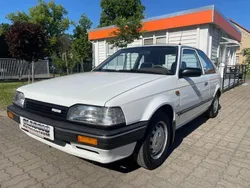 Weiß Gebraucht 1989 Mazda 323 Kleinwagen | 3.990 €