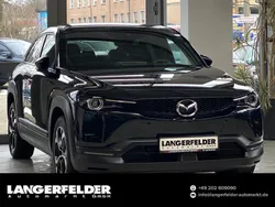 Jet black Gebraucht 2024 Mazda MX30 Makoto SUV | 27.499 € (Fairer Preis)
