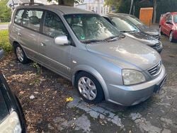 Grau Gebraucht 2002 Kia Carens Van / Kleinbus | 1.500 €