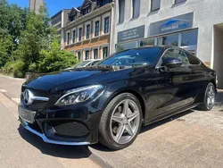 Obsidianschwarz Gebraucht 2016 Mercedes C220 AMG line Coupé | 27.550 € (Teuer)
