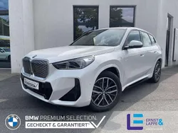 Mineralweiss Gebraucht 2024 BMW iX1 Luxury Line SUV | 44.440 € (Fairer Preis)