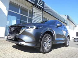 Machine grey Gebraucht 2024 Mazda CX-5 Takumi-Line SUV | 43.770 € (Fairer Preis)