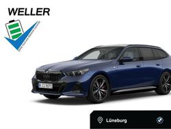 Tansanitblau ii (blau) Gebraucht 2024 BMW 550e M Sport Kombi | 77.950 € (Guter Preis)