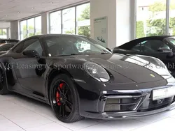 Tiefschwarzmetallic Gebraucht 2024 Porsche 911 Carrera 4 GTS Coupé | 144.800 € (Superpreis)