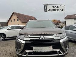 Braun Gebraucht 2021 Mitsubishi Outlander P-HEV Plus SUV | 21.680 € (Fairer Preis)