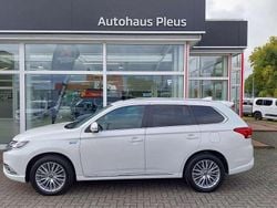 Perlmuttweiß Gebraucht 2021 Mitsubishi Outlander P-HEV Top SUV | 24.875 € (Fairer Preis)