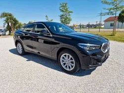 Schwarz ii/bonnet fluid black Gebraucht 2023 BMW X6 Sport Line SUV | 63.400 €