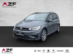 Grau Gebraucht 2024 VW Touran Highline Van / Kleinbus | 49.000 €
