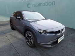 Grau Gebraucht 2024 Mazda MX30 Ad'Vantage SUV | 28.490 € (Etwas zu teuer)