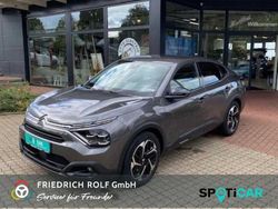 Platinumgrau (metallic) Gebraucht 2023 Citroën C4 Shine Limousine | 24.990 €