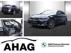 Schwarz Gebraucht 2022 BMW 320e Luxury Line Kombi | 26.840 € (Fairer Preis)