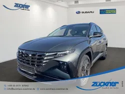 Grau Gebraucht 2021 Hyundai Tucson Prime SUV | 26.990 € (Fairer Preis)