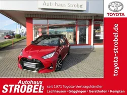 Karminarot metallic, dach schw Neu 2024 Toyota Yaris Hybrid Plus Kleinwagen | 25.580 € (Superpreis)