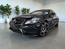 Obsidianschwarz (metallic) Gebraucht 2015 Mercedes E320 AMG Coupé | 27.990 €