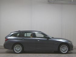 Grau Gebraucht 2022 BMW 320e Sport Line Kombi | 23.980 € (Superpreis)