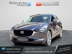 Machine gray Gebraucht 2024 Mazda CX-30 Exclusive-Line SUV | 29.430 € (Etwas zu teuer)