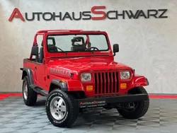 Rot/schwarz Gebraucht 1990 Jeep Wrangler Sport SUV | 31.990 €