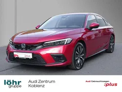 Premium crystal red Gebraucht 2024 Honda Civic Elegance Limousine | 30.980 € (Fairer Preis)