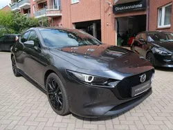 Grau Gebraucht 2024 Mazda 3 Exclusive-Line Limousine | 29.900 € (Fairer Preis)