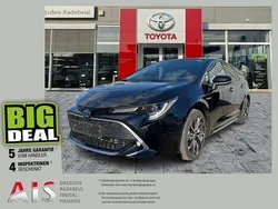 Black mica / ink Gebraucht 2019 Toyota Corolla Lounge Kombi | 24.590 € (Fairer Preis)