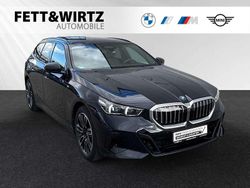 Carbonschwarz metallic Gebraucht 2024 BMW 530e M Sport Kombi | 66.490 €