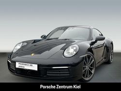 Tiefschwarzmetallic Gebraucht 2021 Porsche 911 Carrera Coupé | 119.980 € (Etwas zu teuer)