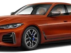 Orange Gebraucht 2024 BMW i4 Shadowline Limousine | 48.499 €