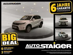 Cool white pearl metallic Neu 2024 Suzuki Vitara Comfort SUV | 22.990 €