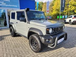 Solid medium gray Gebraucht 2023 Suzuki Jimny Comfort SUV | 31.890 € (Teuer)