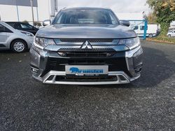 Grau Gebraucht 2021 Mitsubishi Outlander P-HEV Top SUV | 26.980 € (Etwas zu teuer)