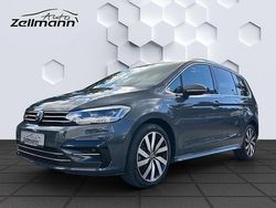 Grau Gebraucht 2024 VW Touran Highline Van / Kleinbus | 35.824 € (Fairer Preis)